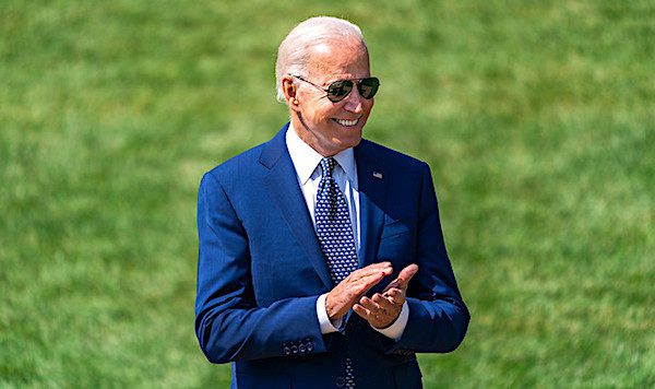 President Joe Biden claps during a clean car event Thursday, August 5, 2021 on the South Lawn of the White House. (Official White House photo by Cameron Smith)